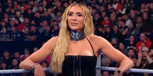 Charlotte Flair celebrates her WWE Women’s Tag Team title defense dedicated to Scarlett Guillen, a young fan battling brain cancer