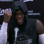 Dennis Schröder standing in his hometown of Braunschweig at the future site of the bilingual school project.