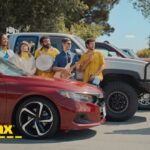 Paige Bueckers posing for CarMax’s “Wanna Drive?” campaign.