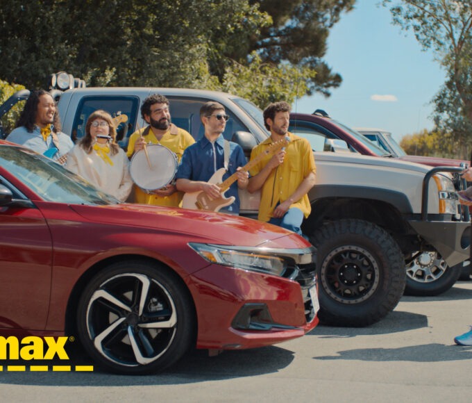 Paige Bueckers posing for CarMax’s “Wanna Drive?” campaign.