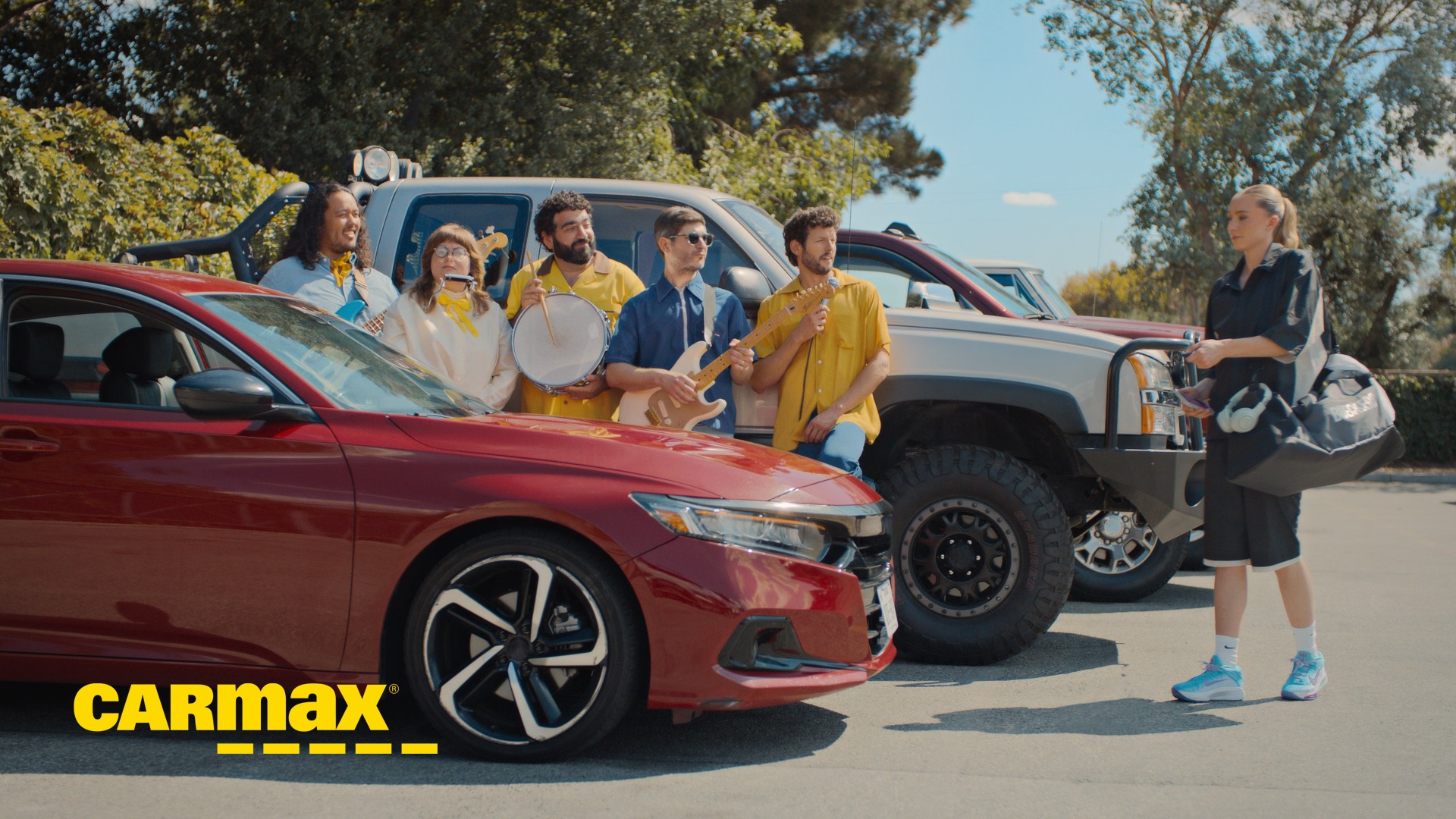 Paige Bueckers posing for CarMax’s “Wanna Drive?” campaign.
