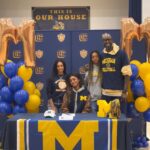 Kapri Garnett prepares to spike during a high school volleyball match.