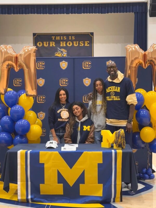 Kapri Garnett prepares to spike during a high school volleyball match.