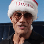 Dwayne “The Rock” Johnson surprising YMCA families during a holiday shopping spree at Walmart