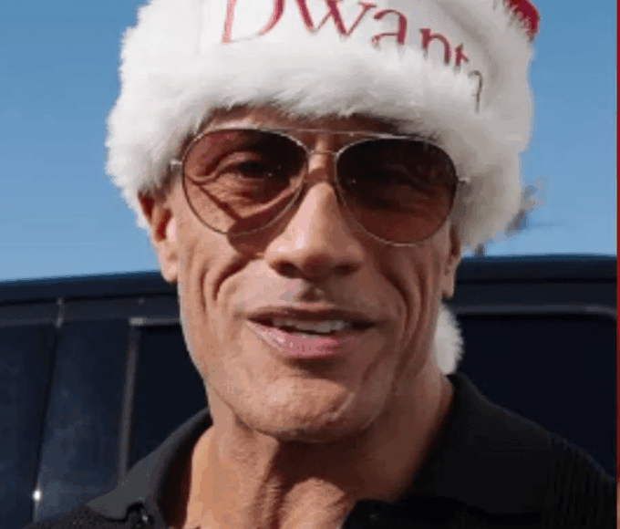 Dwayne “The Rock” Johnson surprising YMCA families during a holiday shopping spree at Walmart