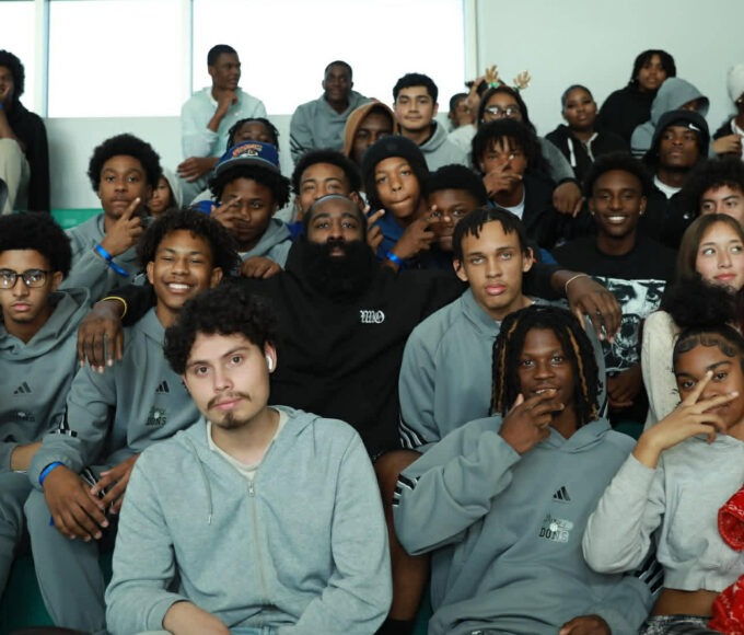 James Harden speaking to students during a surprise visit at Dorsey High School in Los Angeles