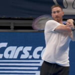 Gordon Hayward rallies forehands with Frances Tiafoe during the Charlotte Invitational tennis exhibition.