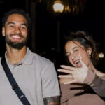 Emeka Egbuka on the field before a major game, focused and determined.