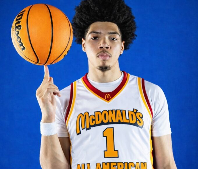 Tyran Stokes serving Happy Meals in a McDonald’s drive-thru after making the McDonald’s All-American Game