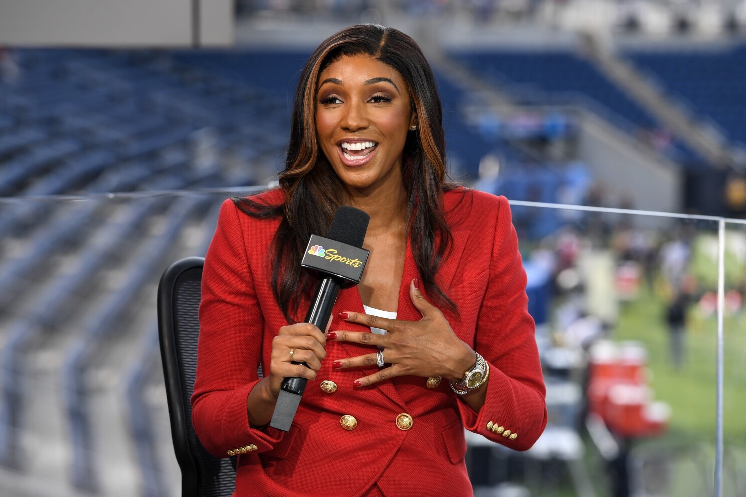 Maria Taylor presenting the Vince Lombardi Trophy to the Seattle Seahawks after hosting the Super Bowl LX pregame show on NBC.